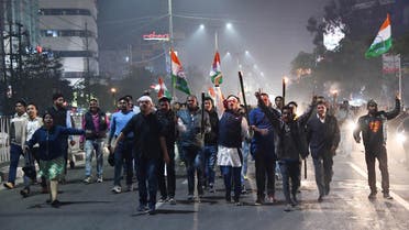 Activists of the Assam Pradesh Congress committee shout slogans during a rally in protest against Citizenship Amendment Bill 2016. (AFP)