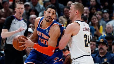 New York Knicks center Enes Kanter, left, is defended by Denver Nuggets forward Mason Plumlee during the second half of an NBA basketball game. (File photo: AP)