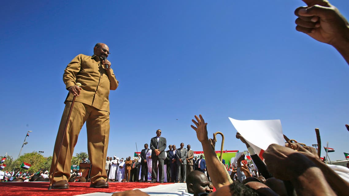 Sudan's President Omar al-Bashir speaks during a rally with his supporters in the Green Square in the capital Khartoum on January 9, 2019.