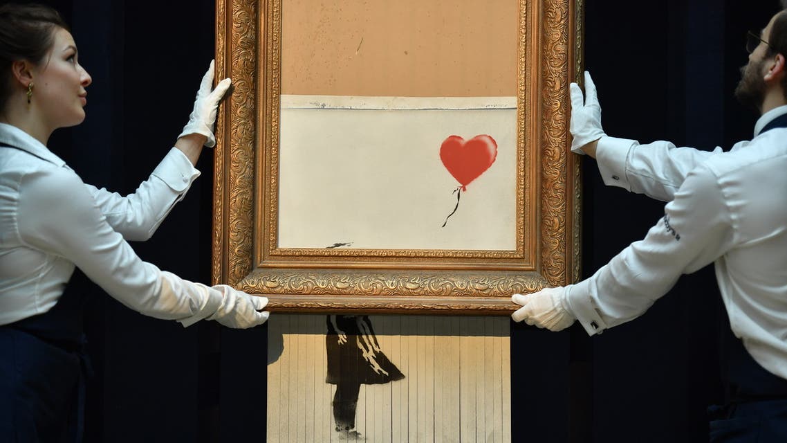 A partially destroyed Banksy canvas