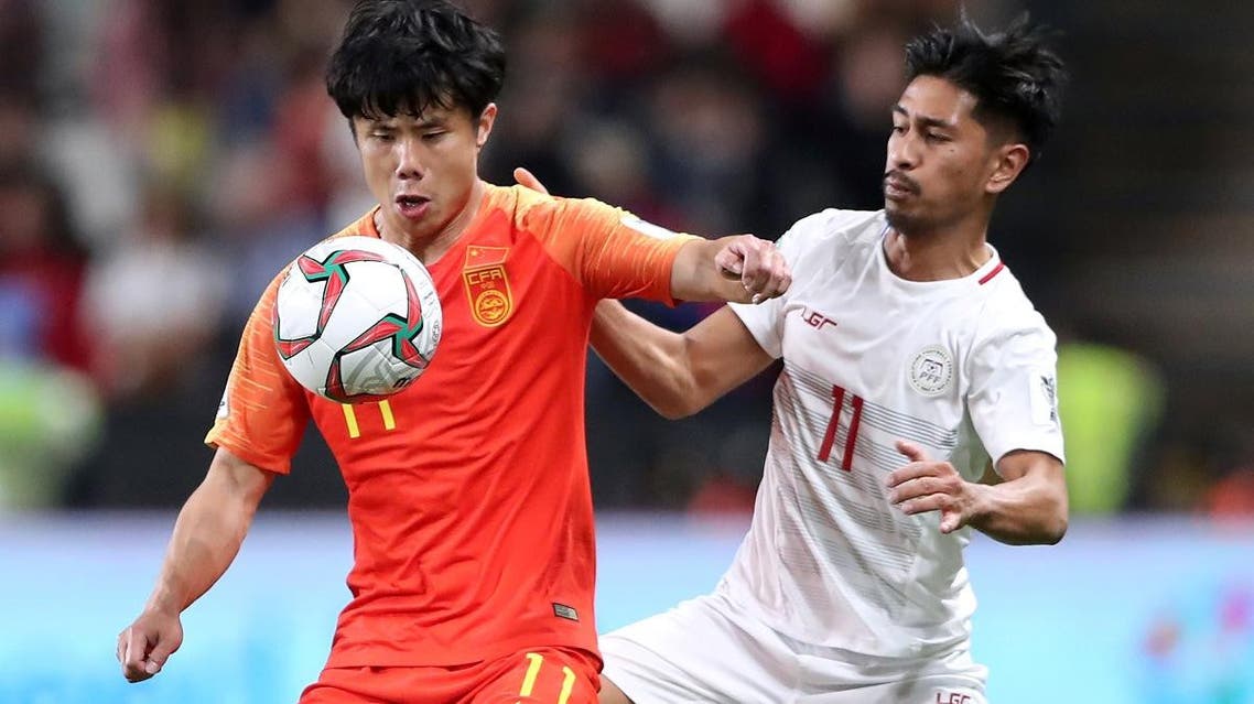 Philippines’ Daisuke Sato in action with China's Hao Junmin. (Reuters)