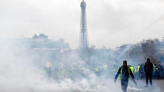 Renewed yellow vest protests hit with police water cannon, tear gas in Paris