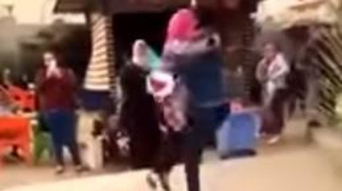Egypt's al Azhar students hugging (YouTube)