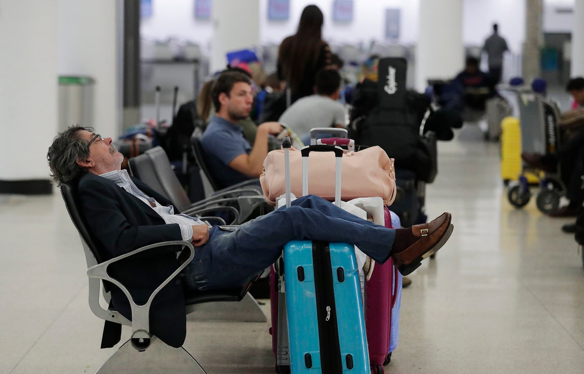 Miami Airport travelers (AP)