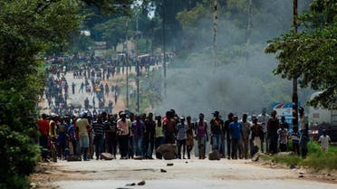 Angry protesters barricade the main route to Zimbabwe's capital Harare from Epworth township on January 14 2019 after announced a more than hundred percent hike in fuel prices. afp