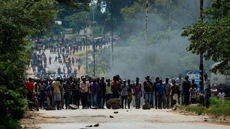 Zimbabwean protesters burn tires, block roads over fuel price hike