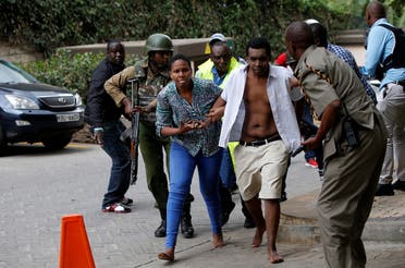 People are evacuated at the scene where explosions and gunshots were heard at the Dusit hotel compound in Nairobi. (Reuters)