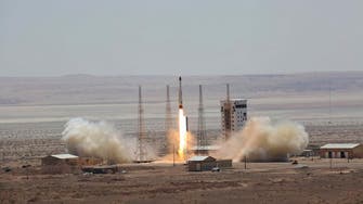 Iran says preparing site for satellite launch; US deems a cover up
