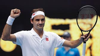 Federer fends off Dan Evans to advance in Australian Open