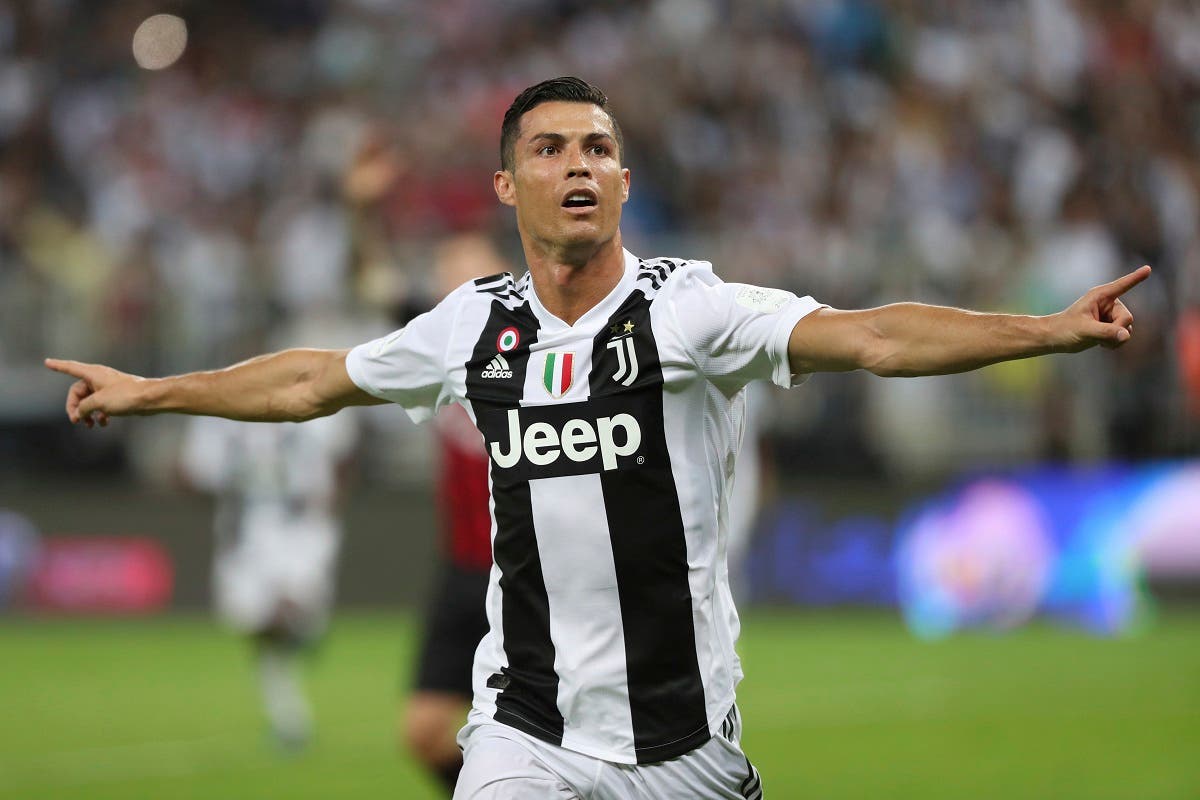 Juventus’ Cristiano Ronaldo celebrates after scoring his side’s opening goal during of the Italian Super Cup final between AC Milan and Juventus at the King Abdullah stadium in Jeddah. (AP)