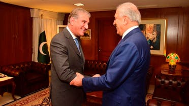 Pakistan’s Foreign Minister Shah Mahmood Qureshi (left), receives US envoy Zalmay Khalilzad at the Foreign Ministry in Islamabad on January 18, 2019. (AP)