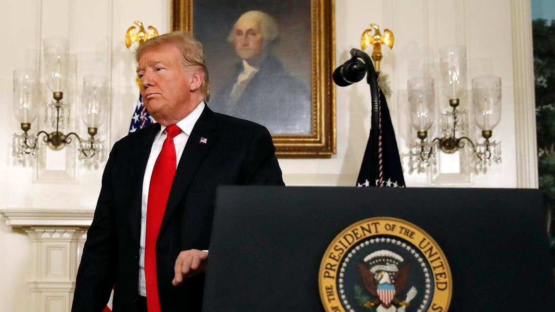 President Donald Trump leaves the podium after speaking about the partial government shutdown, immigration and border security in the Diplomatic Reception Room of the White House, in Washington, Saturday, Jan. 19, 2019. (AP)