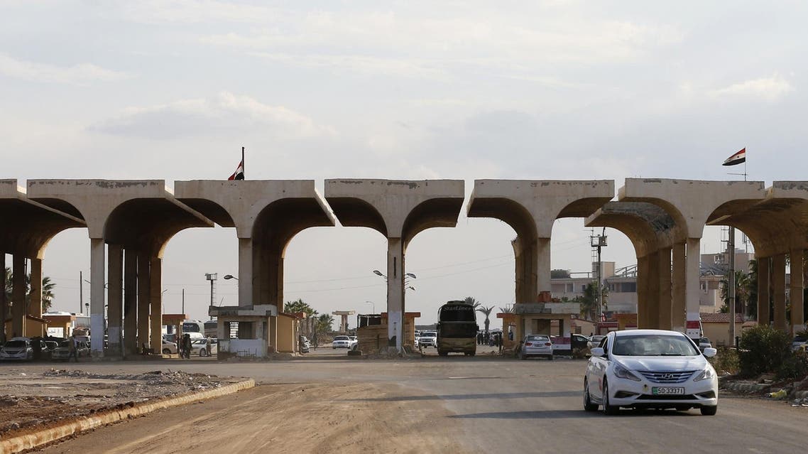 A vehicle steers it's way into Syria through the Nassib border at the Syrian-Jordanian border on November 7, 2018. (File photo: AFP)