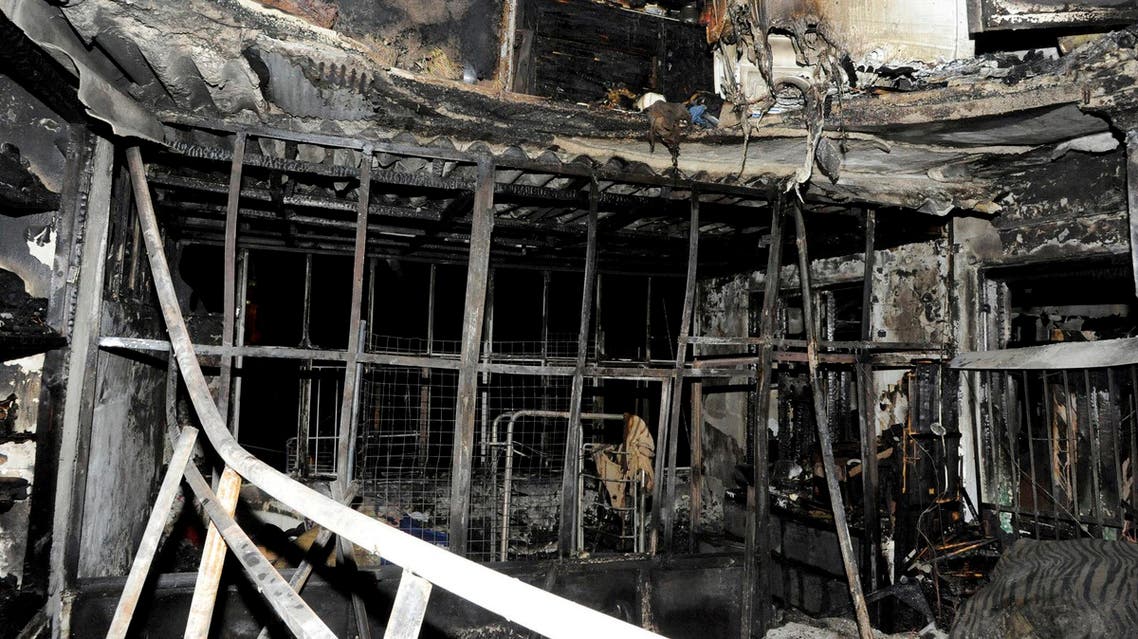 The siblings were asleep in their apartment in the city's old quarter when the fire broke out on Tuesday and spread quickly. (AP)