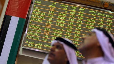 Emirati traders follow the stock market activity at the Dubai Financial Market in the Gulf emirate on December 6, 2009. (File photo: AFP)