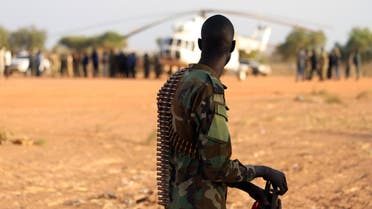 An armed member of the South Sudanese security forces during a ceremony marking the restarting of crude oil pumping at the Unity oil fields in South Sudan, on January 21, 2019. (Reuters)
