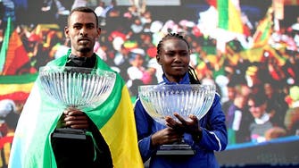 Molla, Chepngetich break course records to win Dubai Marathon