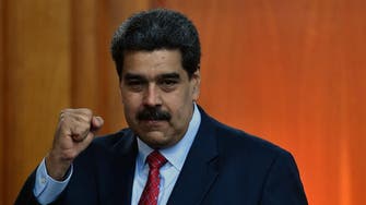 US sanctions Venezuelan state oil firm, Maduro vows legal action