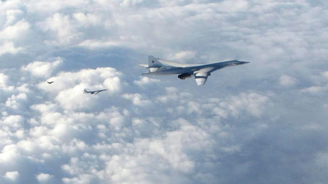 two Russian Blackjack Tupolev Tu-160 long-range bombers are followed by an RAF Typhoon aircraft, left, scrambled from RAF Lossiemouth, Scotland, Jan 15, 2018. (AP)