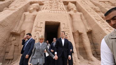 French President Emmanuel Macron arrived Sunday in Egypt with his wife Brigitte, and stopped to visit the iconic temple of Abu Simbel in the south. (AFP)