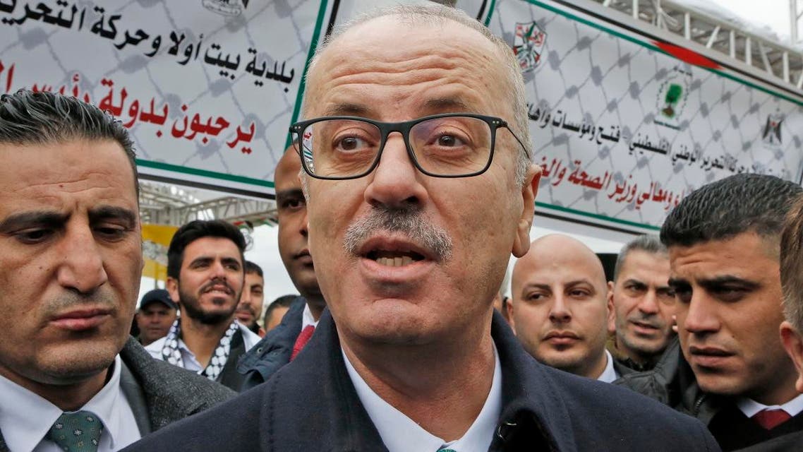Palestinian Prime Minister Rami Hamdallah attends a ceremony to mark the opening of a medical centre in the village of Beit Ula, north of the West Bank city of Hebron on Jan. 28, 2019. (AFP)