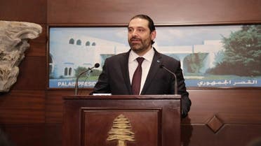 Lebanese Prime Minister Saad al-Hariri addresses the media after announcing the new cabinet during a press conference at the presidential palace. (AFP)