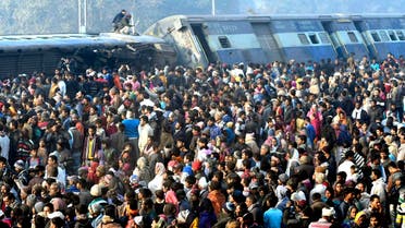 Hundreds of villagers ruia’s dshed to help rescuers and members of Indisaster management to pull out people trapped in the twisted metal and overturned coaches. (AP)