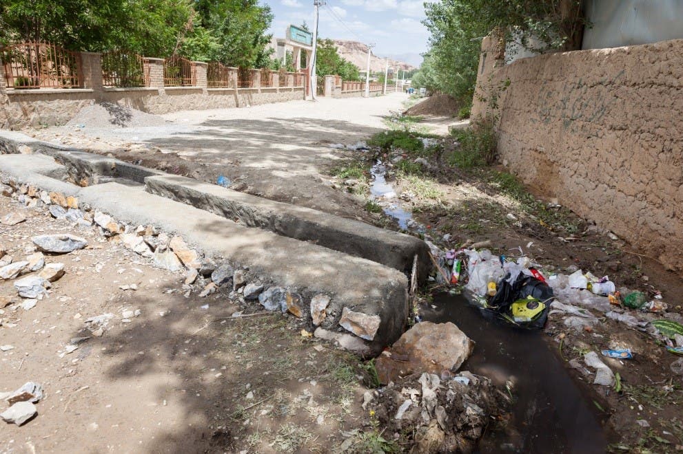 Water drain splitting the road in Bamyan. (Georg Schaumberger)