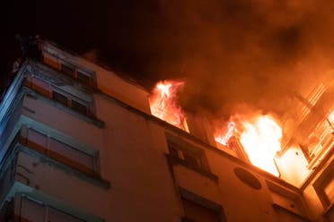 The Paris prosecutor says a woman has been detained in the initial investigation into the fire. (AP)