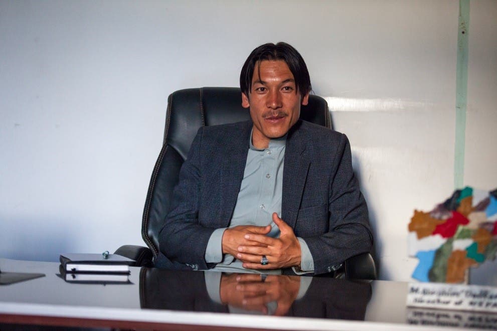 Mohammad Ibrahim Dadfar at his desk at the NEPA Office, Bamyan. (Georg Schaumberger)
