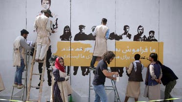 Artists paint mural of journalists killed in Afghanistan during 2018. (File photo: AP)