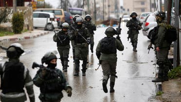 Israeli forces during a raid in Ramallah on Jan. 9, 2019. (AP)
