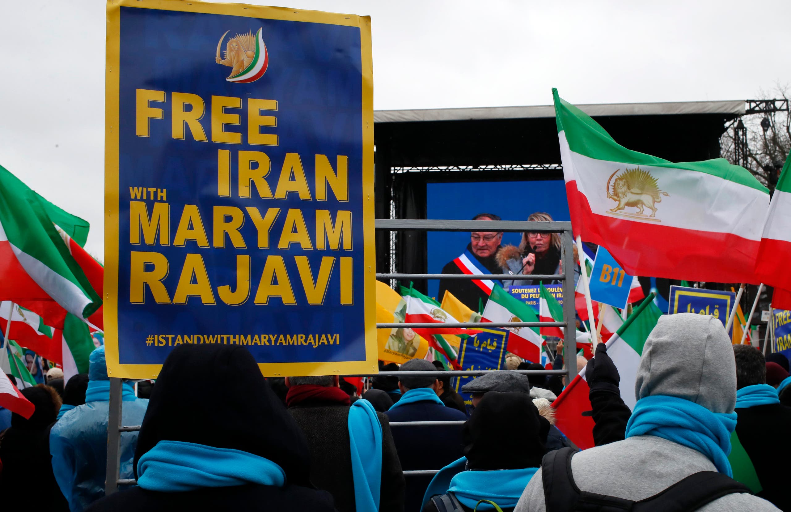Supporters of Maryam Rajavi, the leader of the National Council of Resistance of Iran, demonstrate in Paris, Friday Feb.8, (AP)