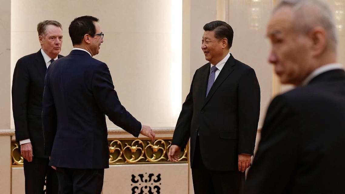US Treasury Secretary Steven Mnuchin (2nd L) talks with Chinese President Xi Jinping as US Trade Representative Robert Lighthizer (L) and Chinese Vice Premier Liu He (R) look in Beijing on February 15, 2019. (AFP)