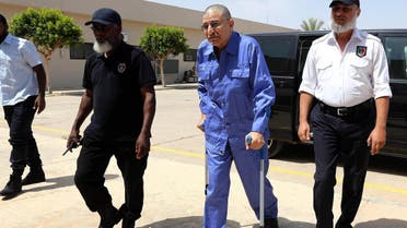 Former Libyan Foreign Intelligence Chief Bouzid Dorda arrives at the court for a hearing in his trial on June 25, 2013 in Tripoli. (AFP)
