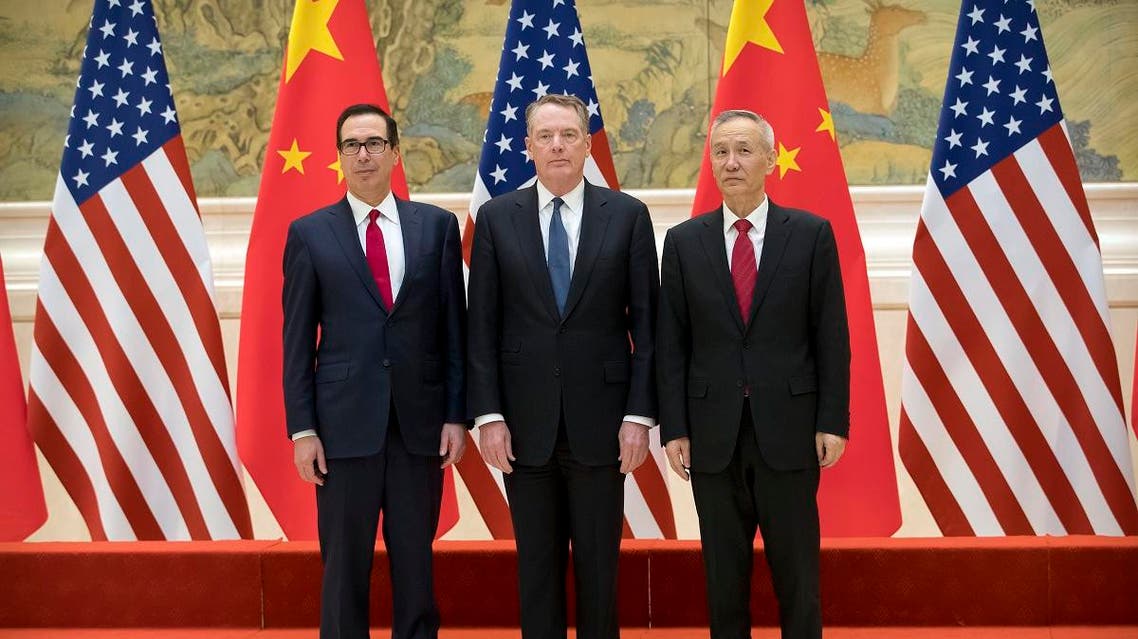(L-R) US Treasury Secretary Steven Mnuchin, US Trade Representative Robert Lighthizer and Chinese Vice Premier Liu He pose for a group photo at the Diaoyutai State Guesthouse in Beijing on February 15, 2019. (AFP)