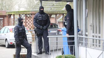 German police raid 16 homes of suspected extremists