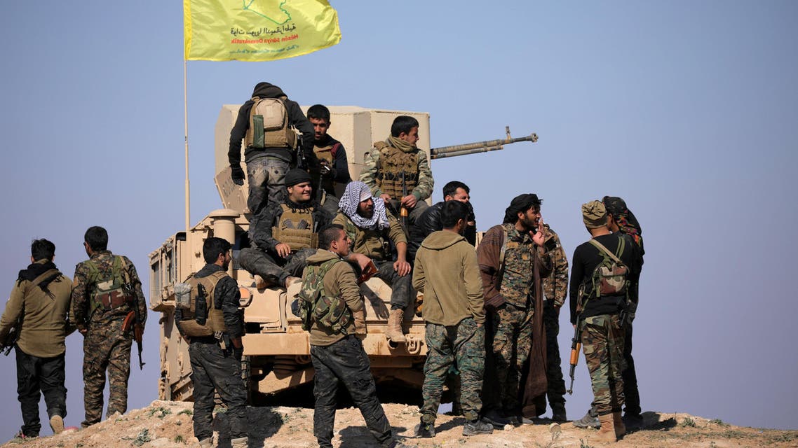Members of Syrian Democratic Forces (SDF) stand together near Baghouz, Deir Al Zor province, Syria February 12, 2019. Picture taken February 12, 2019. REUTERS/ Rodi Said