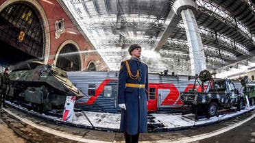A Russian honor guard soldier stands next to the train with “Syrian turning point” exhibition items organized by Russian Defense Ministry, as it waits to depart from Kazansky railway station in Moscow on February 23, 2019.  (AFP)