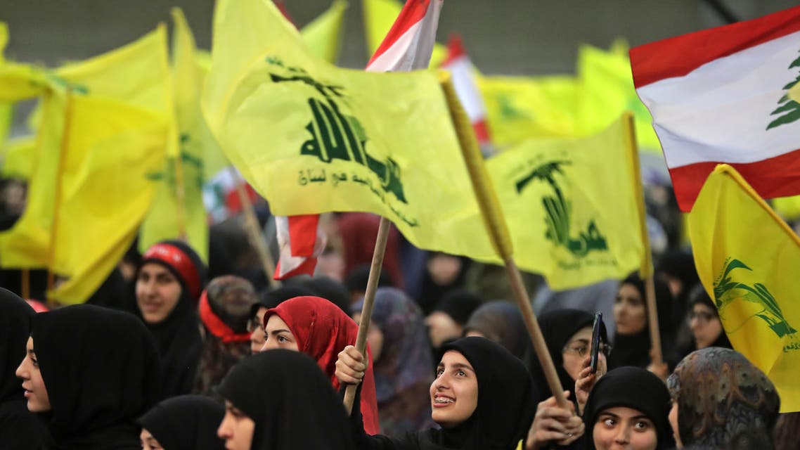 Supporters of Lebanese Hezbollah Leader gather as he delivers a televised speech during a ceremony held by the Shiite party in the capital Beirut, commemorating the party's killed leaders, on February 16, 2018. 