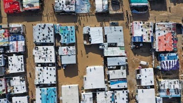 An aerial view shows an informal tent settlement housing Syrian refugees in the Bekaa Valley, Lebanon. (File photo: AFP)