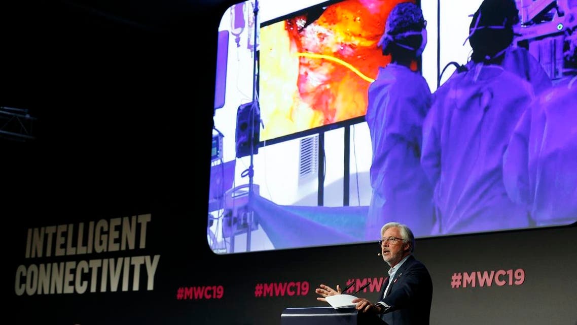 Doctor Antonio Lacy of Hospital Clinic de Barcelona delivers a speech about the first 5G tele-mentored live surgery at the Mobile World Congress (MWC) in Barcelona on February 27, 2019. (AFP)
