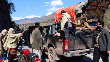 Pakistani Kashmiri residents evacuate from the border town of Chakothi in Pakistan-administered Kashmir, on Febraury 27, 2019. (AFP)