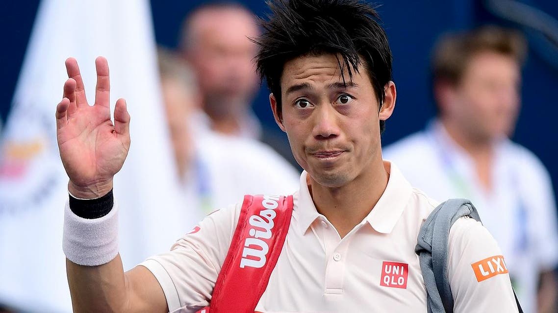 Kei Nishikori of Japan leaves after losing to Hubert Hurkacz of Poland during the ATP Dubai Duty Free Tennis Championship in the Dubai on February 27, 2019. (AFP)
