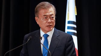 South Korea’s Moon ups defense spending, urges north to talk