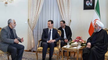 صورة تجمع الأسد بروحاني وقاسم سليماني