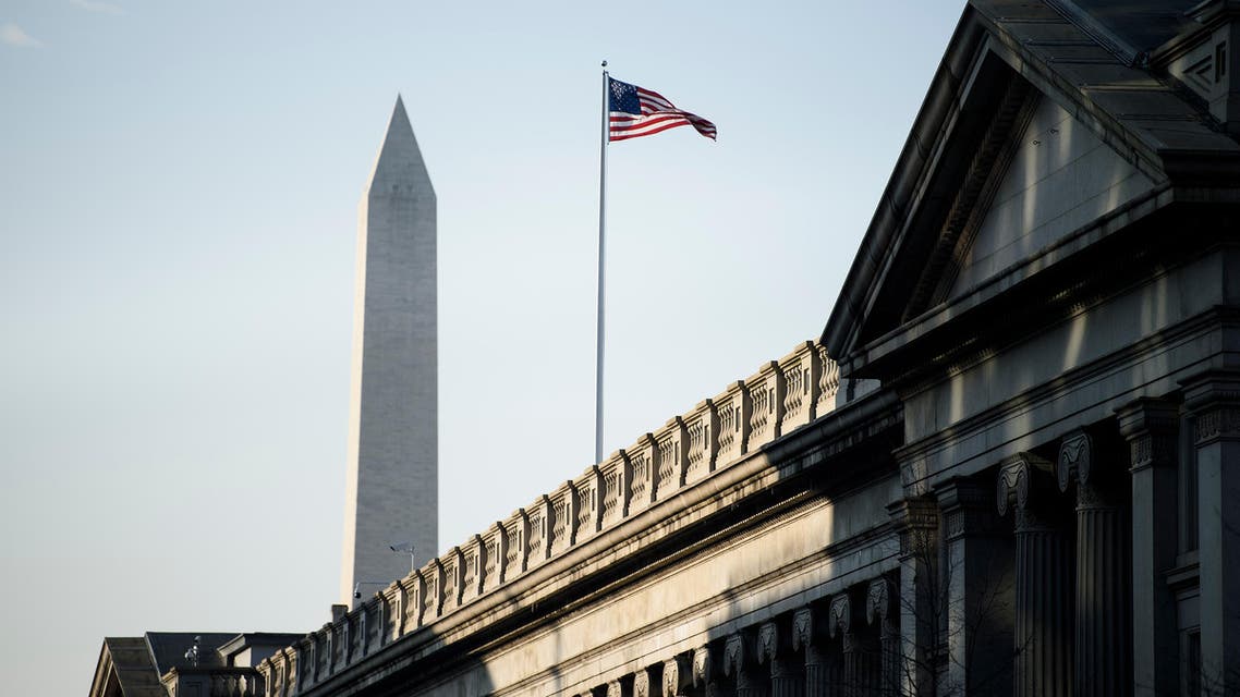 A view of the US Treasury building and the Washington Monument(L) are seen on February 6, 2019 in Washington, DC. 