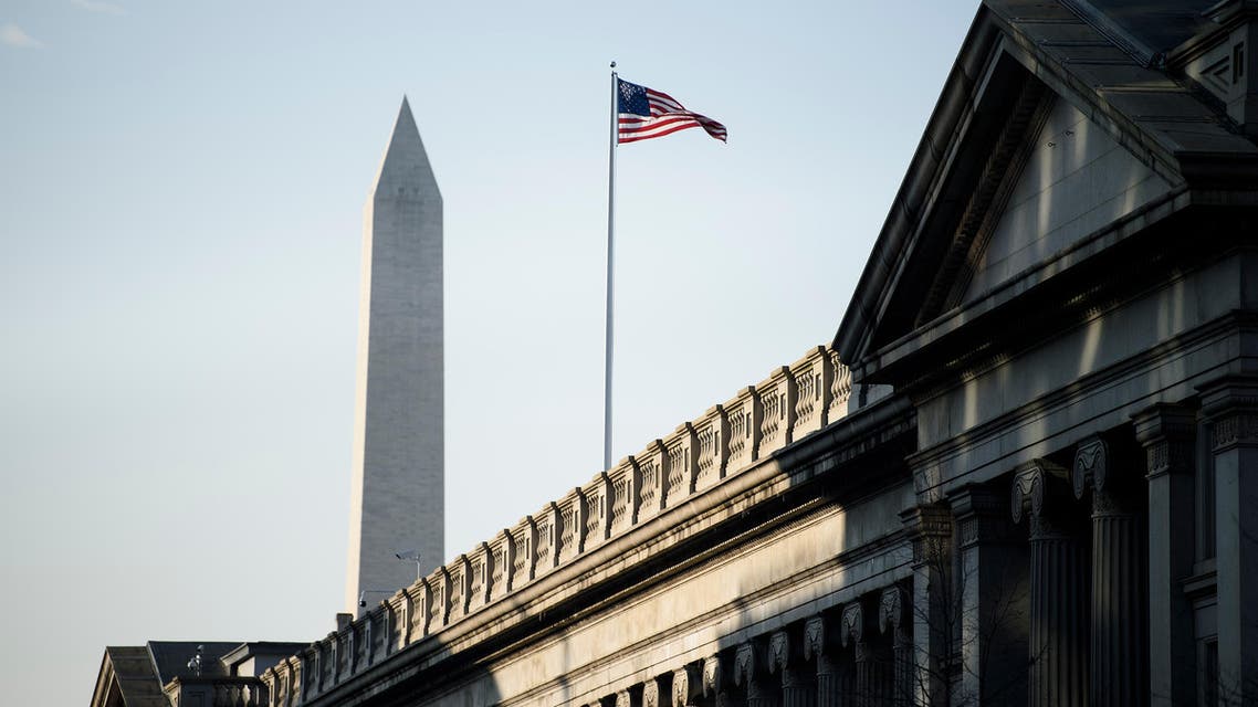 A view of the US Treasury building and the Washington Monument(L) are seen on February 6, 2019 in Washington, DC.