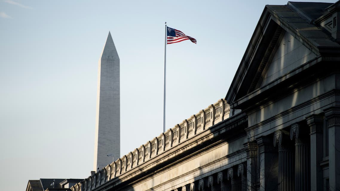 A view of the US Treasury building and the Washington Monument(L) are seen on February 6, 2019 in Washington, DC.