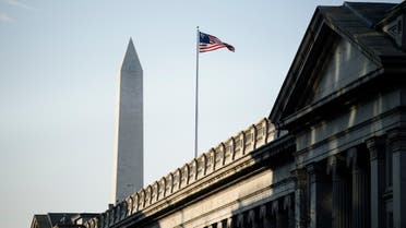 A view of the US Treasury building and the Washington Monument(L) are seen on February 6, 2019 in Washington, DC. 